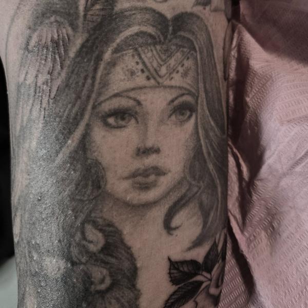 Realism female portrait tattoo by @lilroytattoos