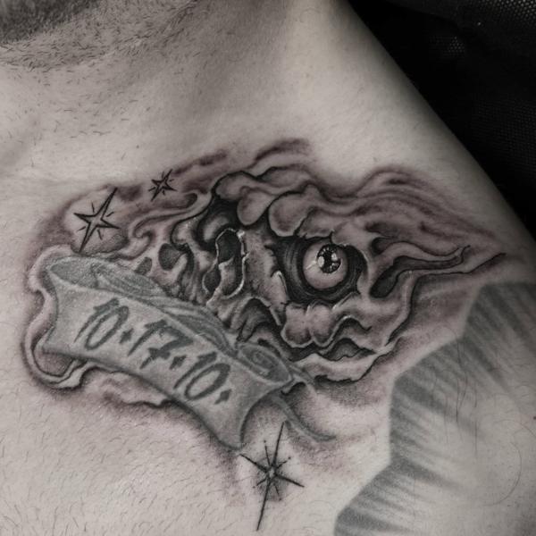 Black And Grey melting skull tattoo by @lilroytattoos