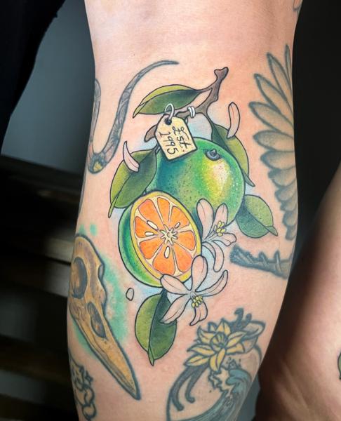 Illustrative citrus fruit tattoo by @linkachuu.tattoo