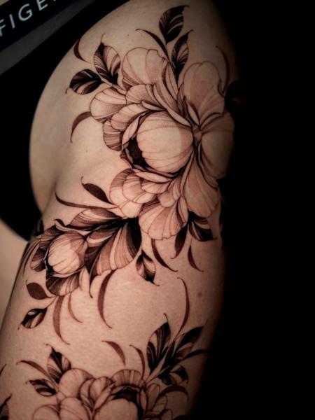 Blackwork floral design tattoo by @lisa__ink