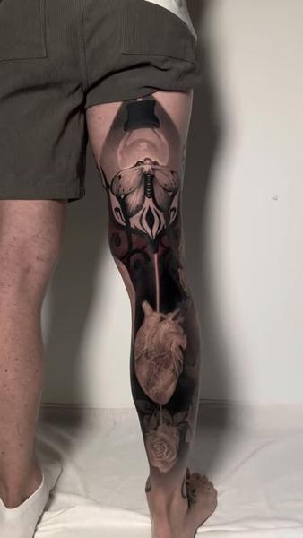 Realism moth and heart tattoo by @lisaammertattoo