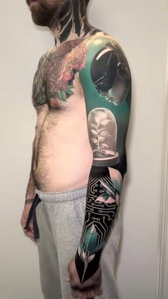 Realism robotic figure tattoo by @lisaammertattoo
