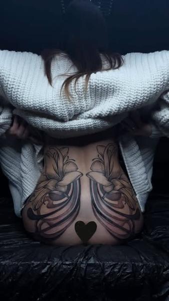 Illustrative floral abstract tattoo by @loreta.win.tattoo