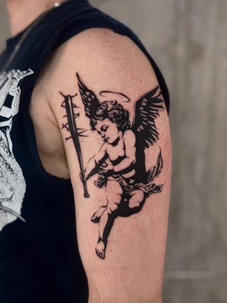 Blackwork angel with bat tattoo by @loz_tattooer