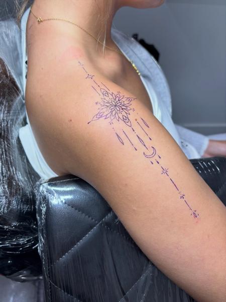 Fine line mandala celestial tattoo by @lucie.tattoo