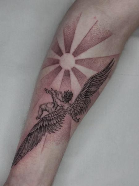 Fine line winged cherub tattoo by @lucky_lou_tattoos