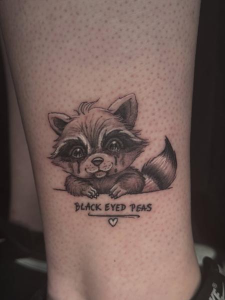 Illustrative crying raccoon tattoo by @luisjtattoos