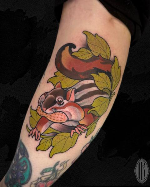 Neo-traditional squirrel with nut tattoo by @lukaskaytattoo