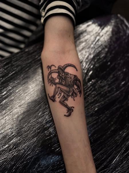 Blackwork jester tattoo by @lukaszmtattoo