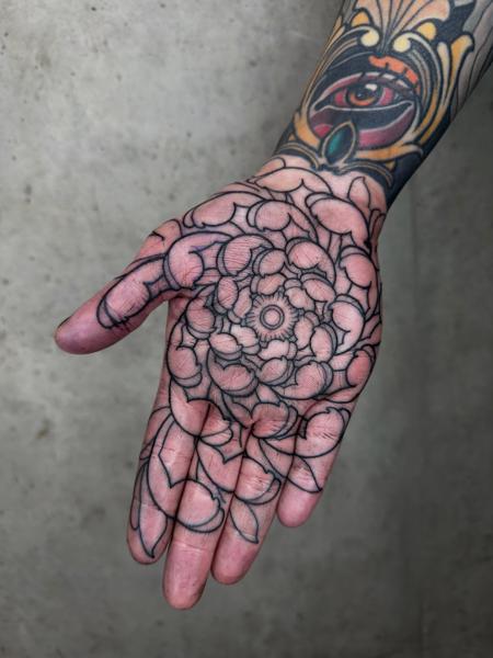 Linework mandala flower tattoo by @lukeaashley