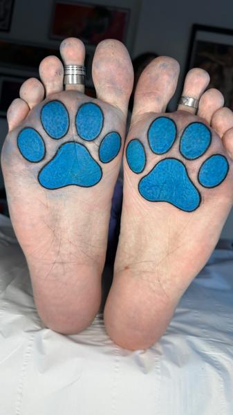 Color paw prints tattoo by @lukeaashley