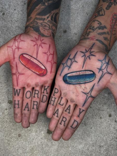 Color Realism red and blue pills tattoo by @lukeaashley