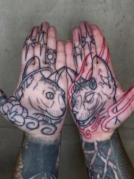 Linework cat faces tattoo by @lukeaashley