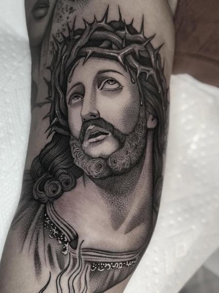 Realism jesus portrait tattoo by @lunalucerotattoo