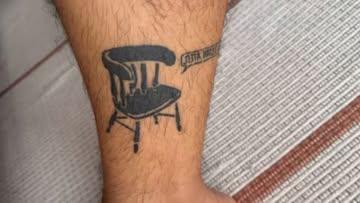 Blackwork chair speech bubble tattoo by @atsoumpeli
