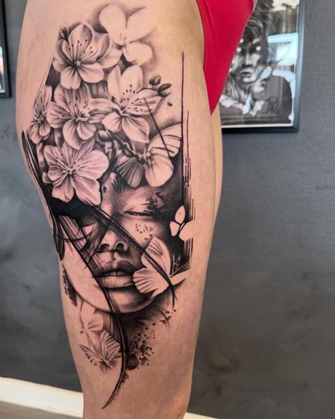 Realism floral portrait tattoo by @mads.flugt