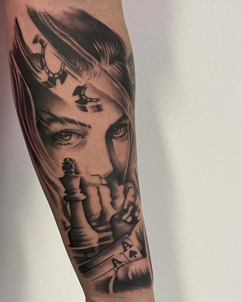 Realism woman chess cards tattoo by @mads.flugt