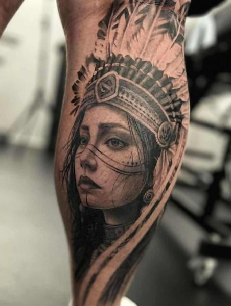 Realism feathered headdress woman tattoo by @mads.flugt