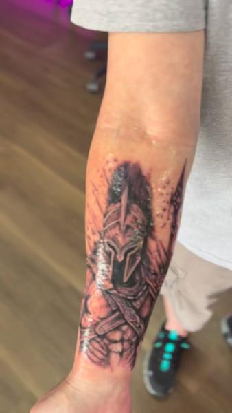 Realism knight helmet tattoo by @maebeautifulpoison