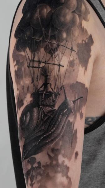 Realism snail airship tattoo by @magetower.tattoo