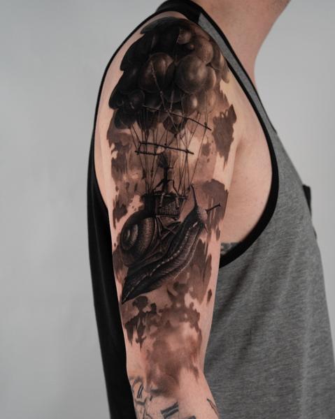 Realism snail airship tattoo by @magetower.tattoo