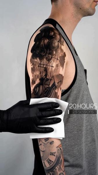 Realism balloon ship tattoo by @magetower.tattoo