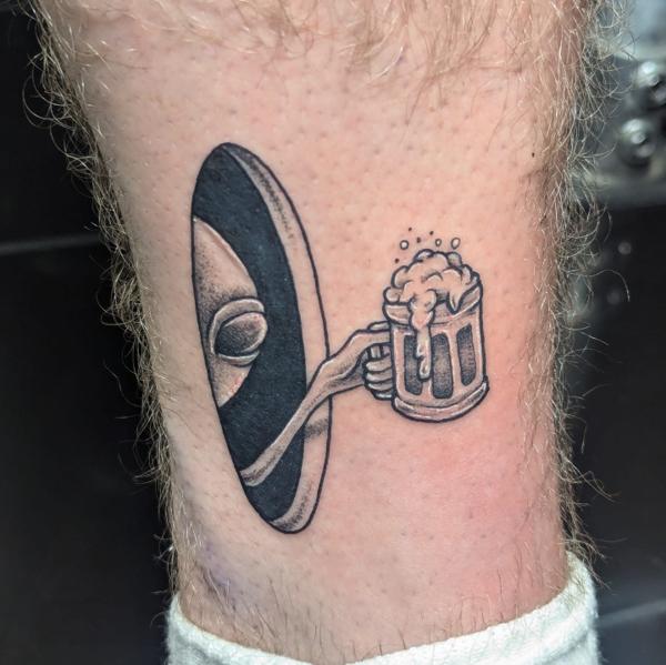Illustrative alien with beer tattoo by @maisie.llewellyn