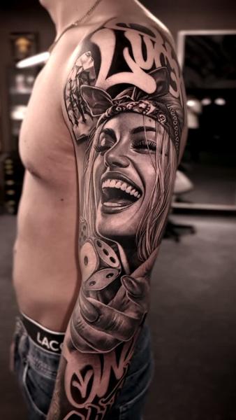 Realism smiling woman tattoo by @maksimprimo