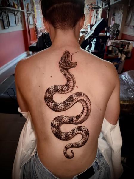 Geometric geometric snake tattoo by @manic.tatts