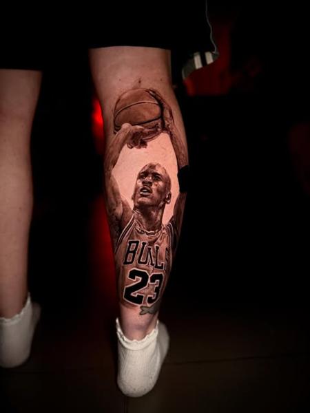 Realism basketball player tattoo by @manic.tatts