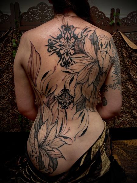 Blackwork floral ornamental tattoo by @manishi_inkatattoo