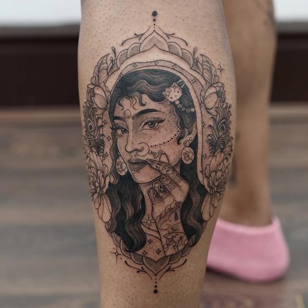 Illustrative blackwork indian woman portrait tattoo by @manvmadetattoos
