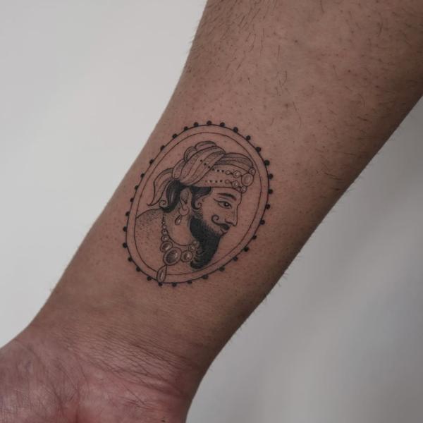 Illustrative indian portrait tattoo by @manvmadetattoos