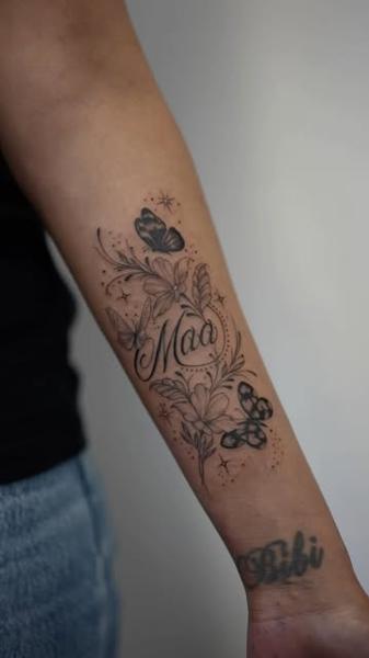 Fine line floral script floral butterflies script tattoo by @manvmadetattoos