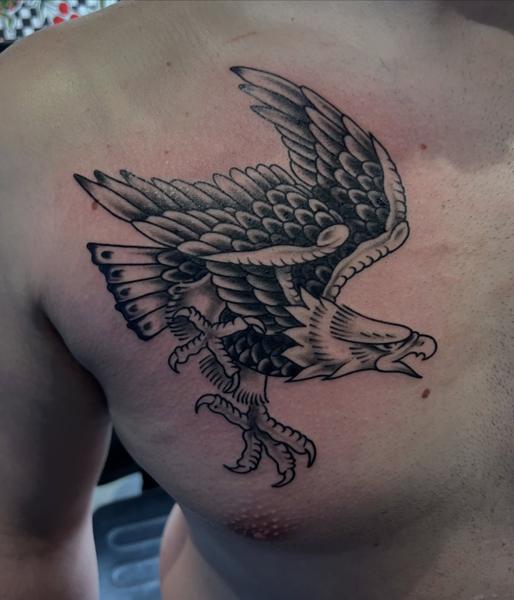 Traditional flying eagle tattoo by @not_cultured_tattoo