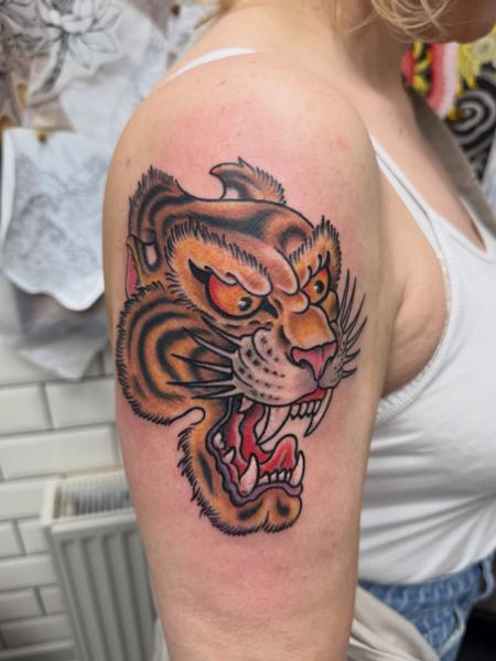 Traditional tiger head tattoo by @not_cultured_tattoo