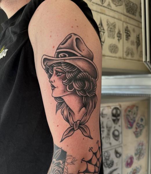 Traditional woman with hat tattoo by @not_cultured_tattoo