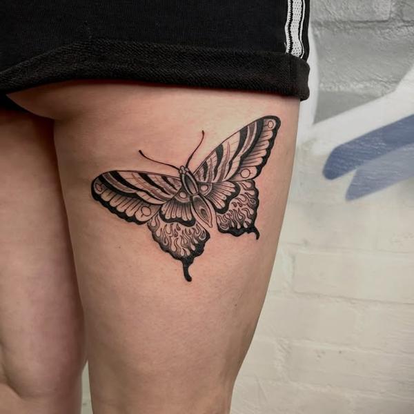 Blackwork butterfly tattoo by @marcelclaude.tattoo