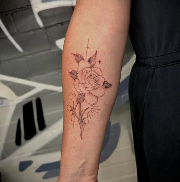 Fine line floral rose tattoo by @marcelclaude.tattoo