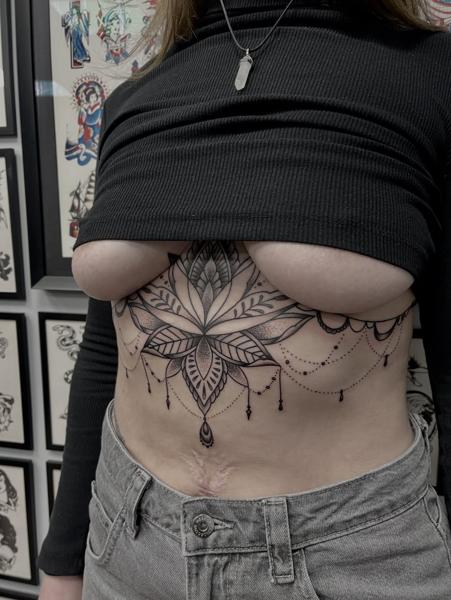 Ornamental ornamental flower tattoo by @marc_studio_ink