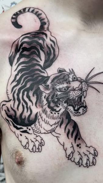 Traditional tiger tattoo by @marc_studio_ink