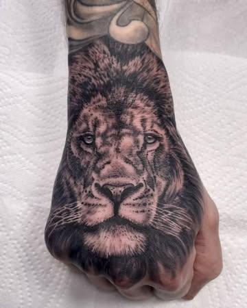 Realism lion portrait tattoo by @marc_studio_ink