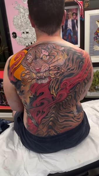 Japanese tiger with flames tattoo by @marcustattoos