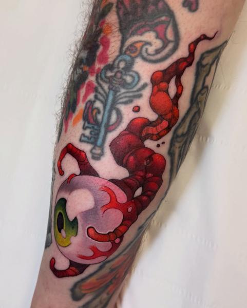New school eyeball creature tattoo by @marcustattoos