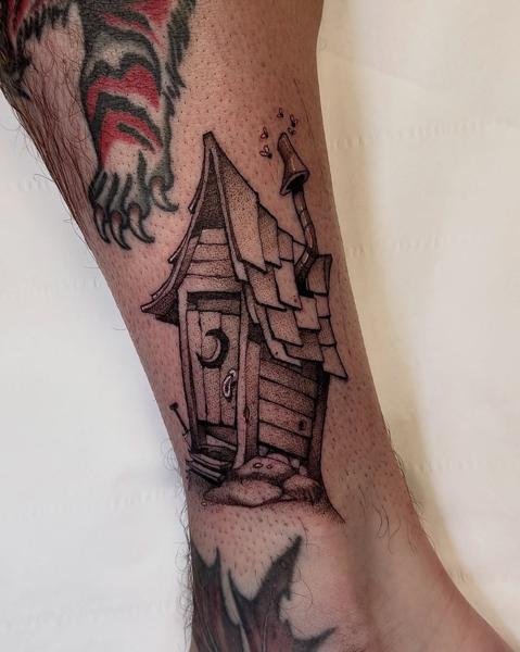 Illustrative wooden outhouse tattoo by @marcustattoos