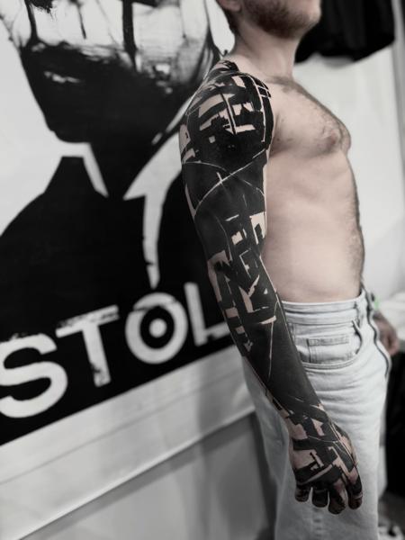 Blackwork abstract sleeve tattoo by @marcus_giuliano_stolz_tattoo