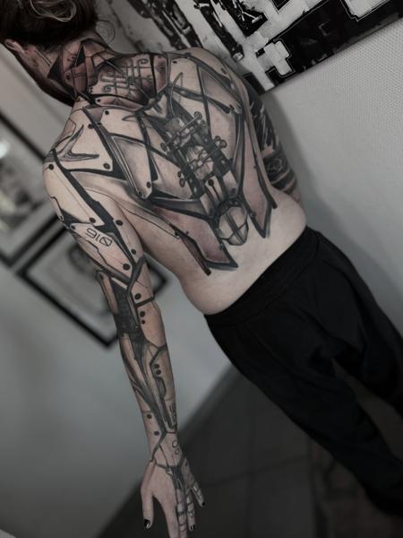 Biomechanical biomechanical design tattoo by @marcus_giuliano_stolz_tattoo