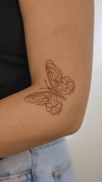 Fine line abstract butterfly tattoo by @marditattoo
