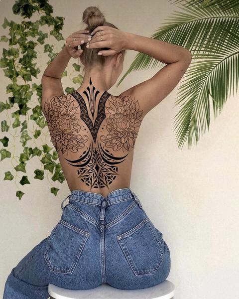 Ornamental floral ornamental tattoo by @garagetattooshop