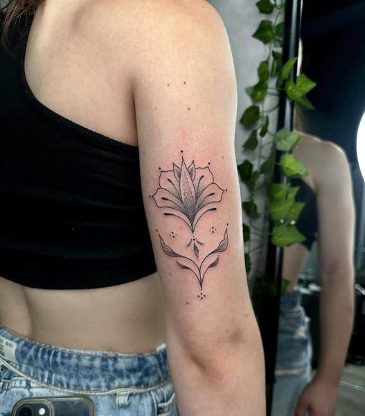 Fine line geometric flower tattoo by @garagetattooshop